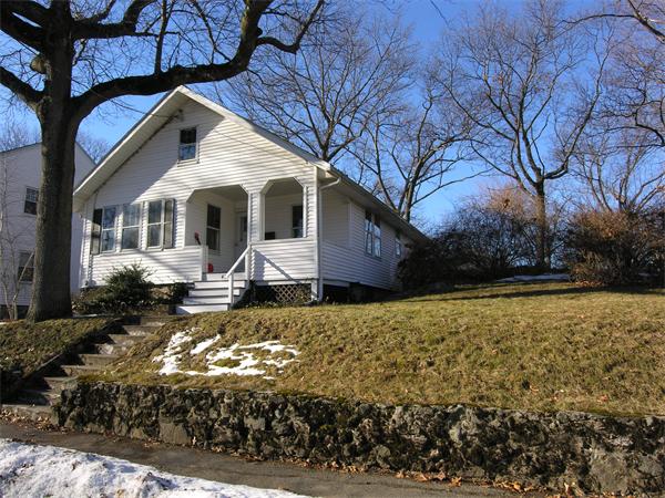 41 Grandview Road Arlington, MA 02476 - Photo 1 of 1 a front view of house with yard and trees around