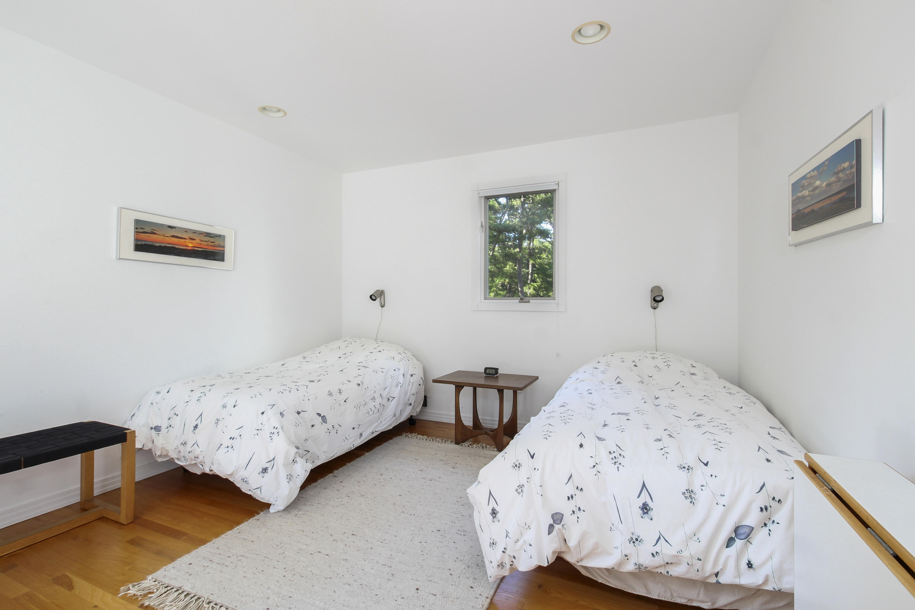 164 Long Pond Road Wellfleet, MA 02667 - Photo 16 of 33 a bedroom with two beds and painting on the wall