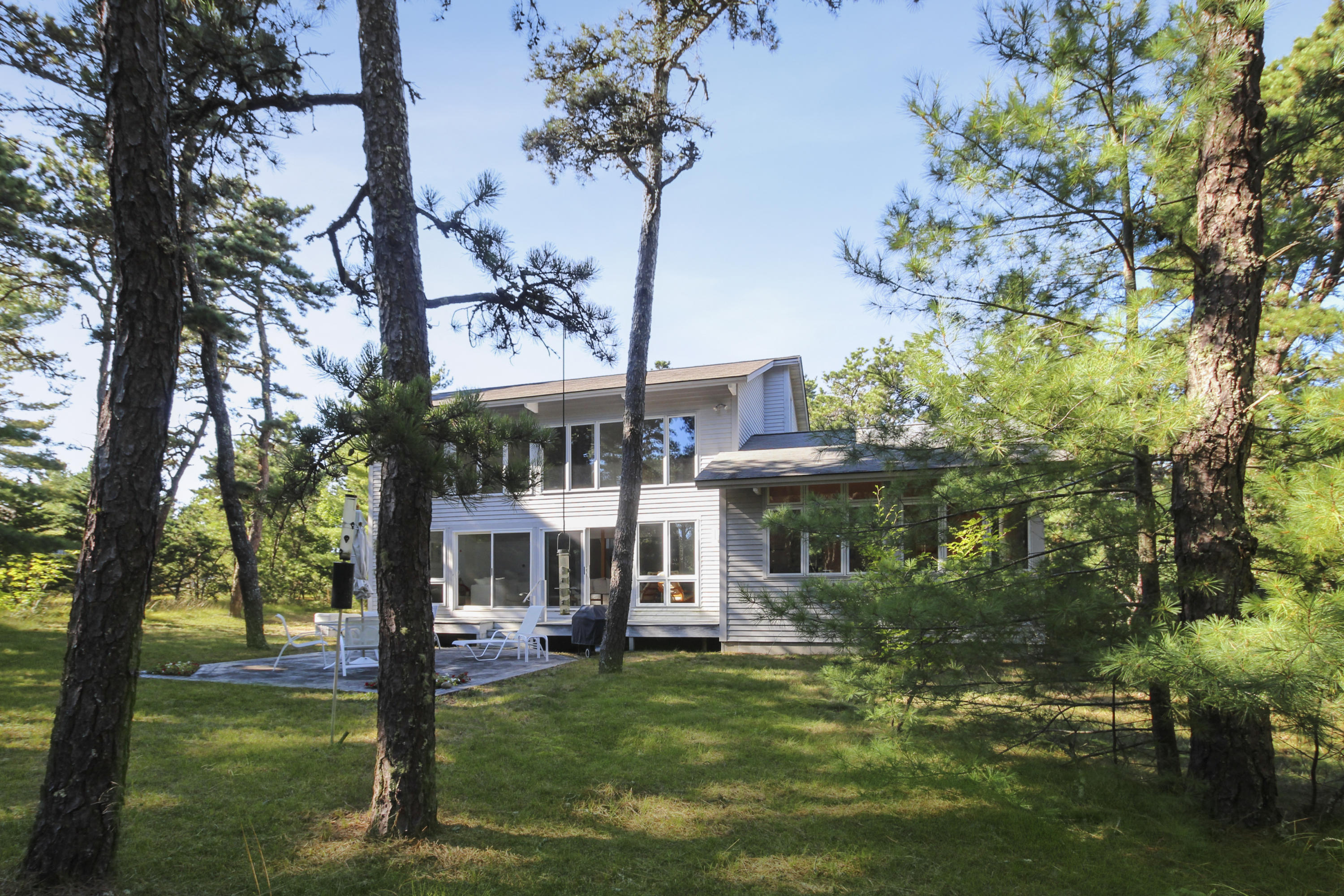 164 Long Pond Road Wellfleet, MA 02667 - Photo 32 of 33 front view of a house with a garden