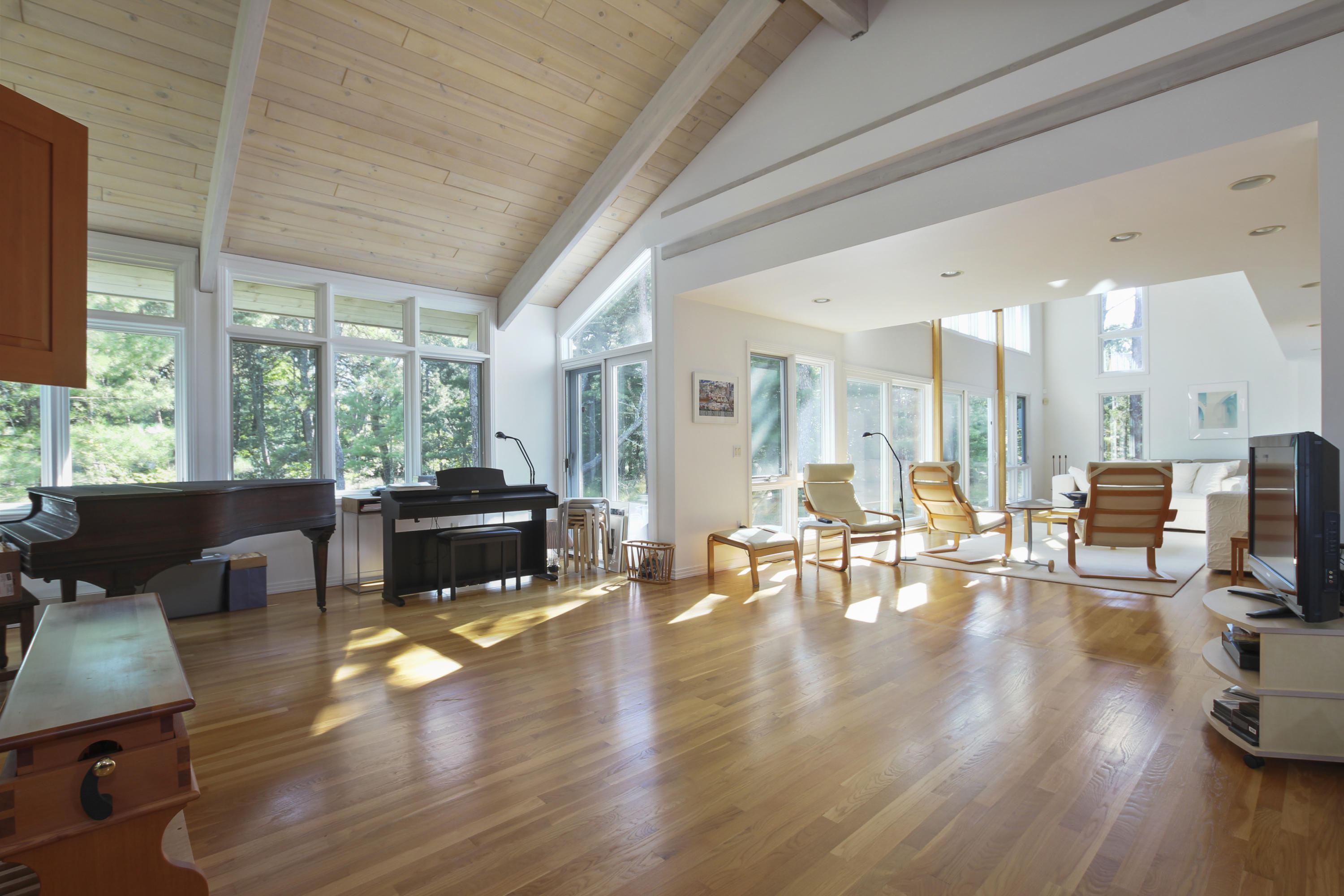 164 Long Pond Road Wellfleet, MA 02667 - Photo 9 of 33 a living room with furniture and a wooden floor