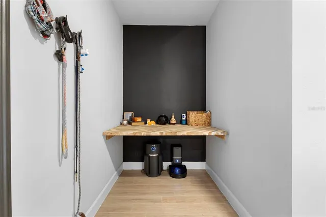 a view of a bathroom with a sink and mirror