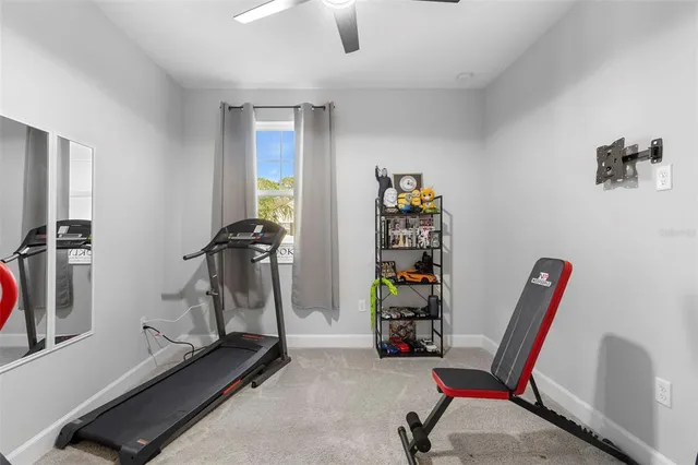 a view of a room with gym equipment