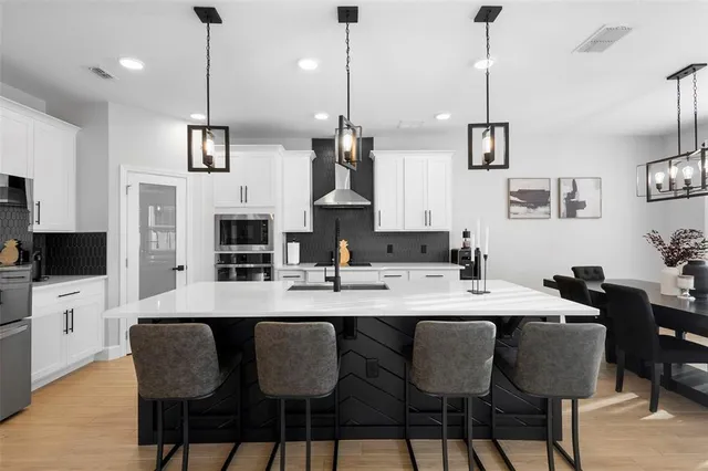 a view of kitchen with breakfast area