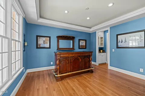 a view of front door with wooden floor