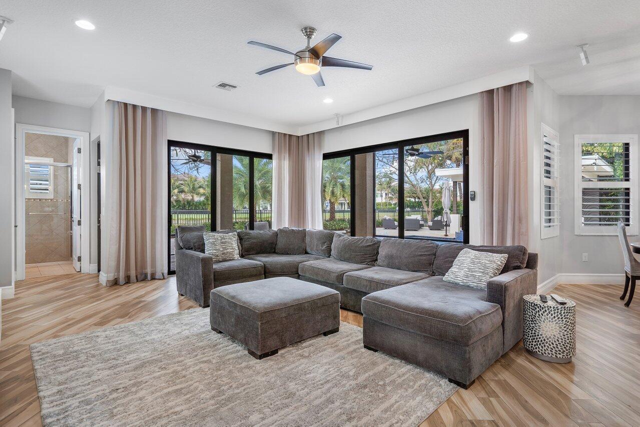 16857 Pierre Circle Delray Beach, FL 33446 - Photo 15 of 57 a living room with furniture and a large window