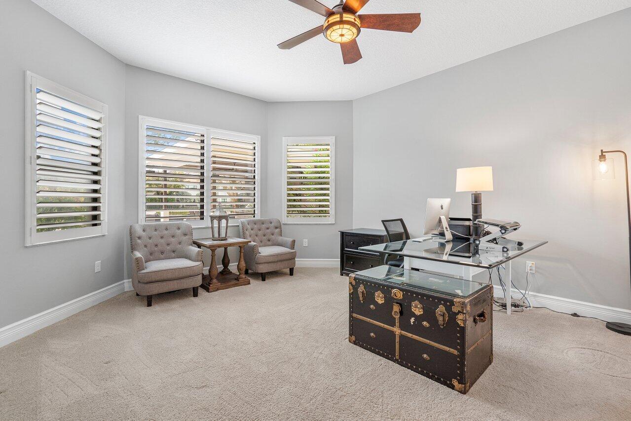 16857 Pierre Circle Delray Beach, FL 33446 - Photo 19 of 57 a bedroom with furniture and a window