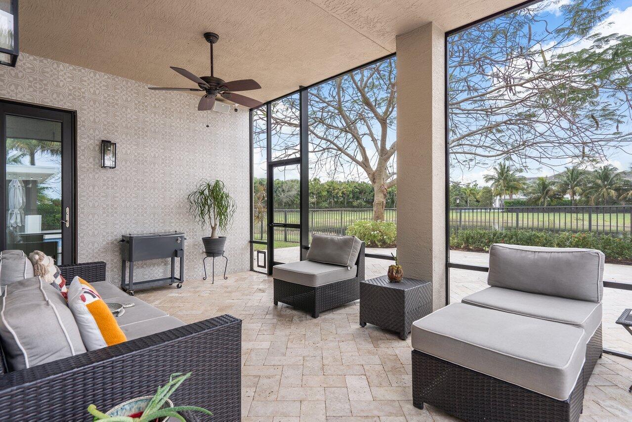 16857 Pierre Circle Delray Beach, FL 33446 - Photo 35 of 57 a living room with furniture and a large window