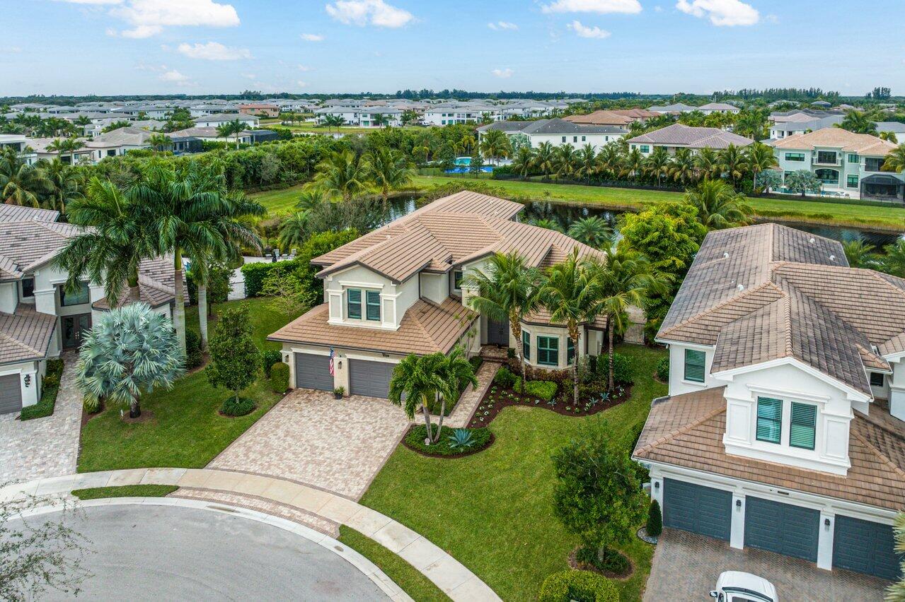 16857 Pierre Circle Delray Beach, FL 33446 - Photo 47 of 57 an aerial view of a house with a garden and lake view