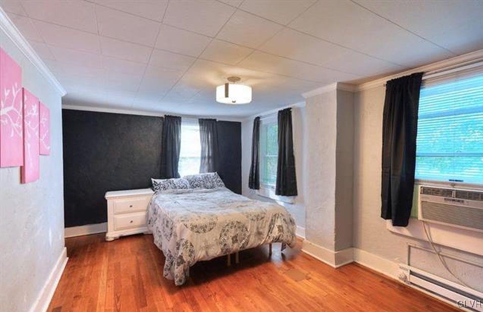 2205 Long Run Road Lehighton, PA 18235 - Photo 6 of 9 a bedroom with a bed and a flat tv screen on dresser