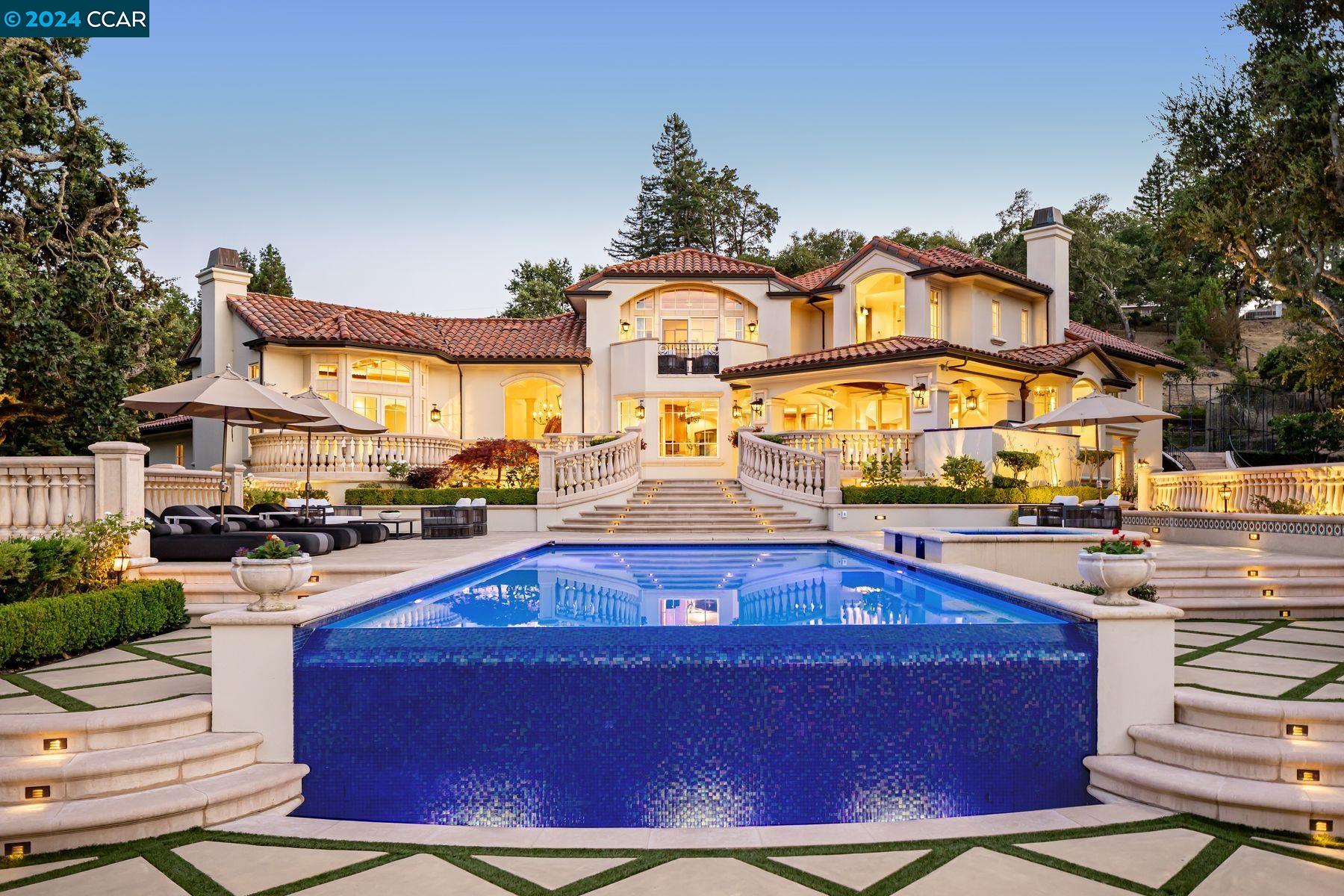 a view of a building with cars park