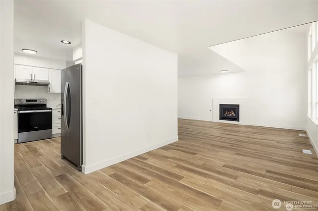 a view of a kitchen from the hallway
