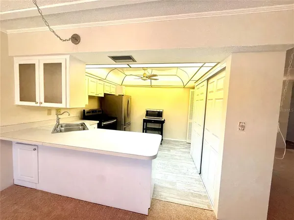 a bathroom with sink and mirror