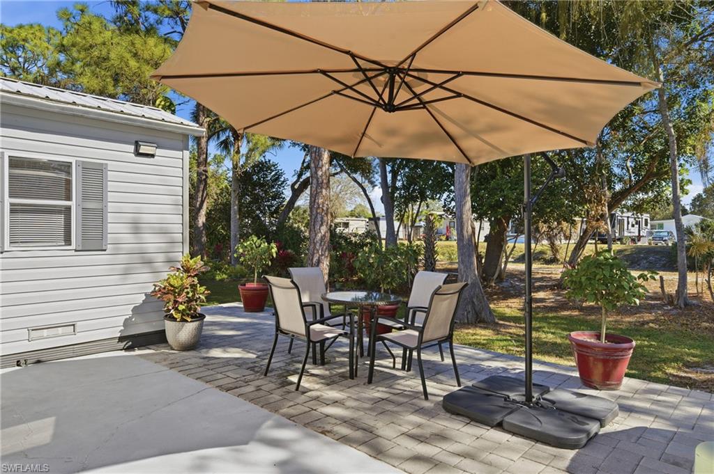 View of patio with outdoor dining space