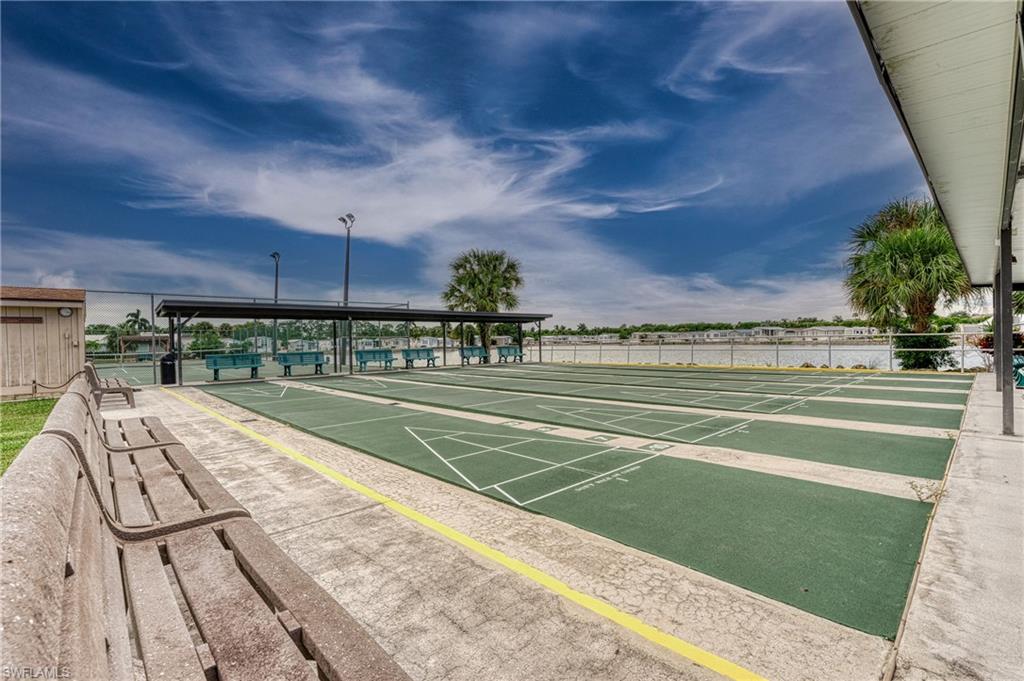 26 Bass Lane Naples, FL 34114 - Photo 16 of 26 View of home's community featuring shuffleboard