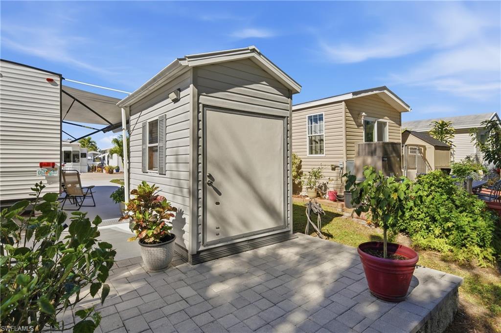 26 Bass Lane Naples, FL 34114 - Photo 6 of 26 View of shed