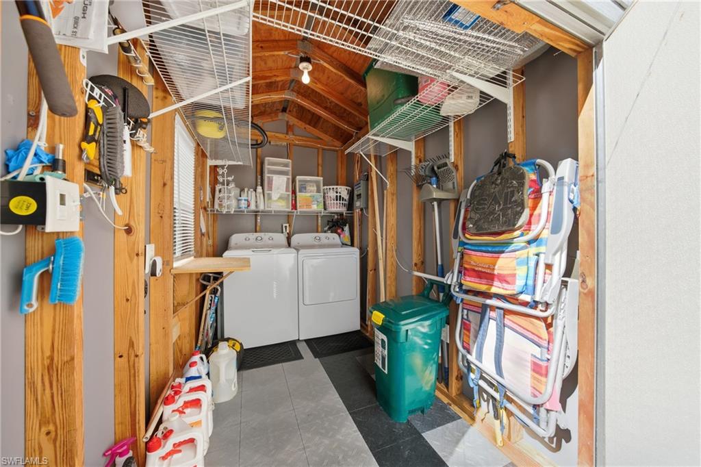 26 Bass Lane Naples, FL 34114 - Photo 7 of 26 Storage area with washer and dryer