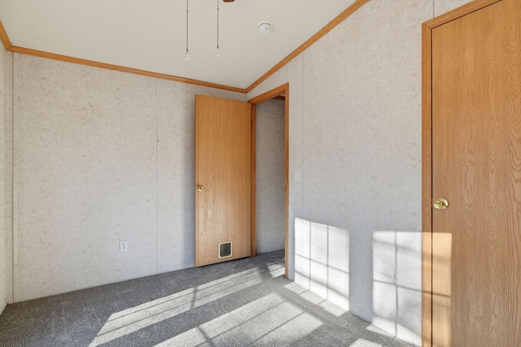 15 Quaboag Valley, Unit 15 Sudbury, MA 01776 - Photo 26 of 35 a view of an empty room