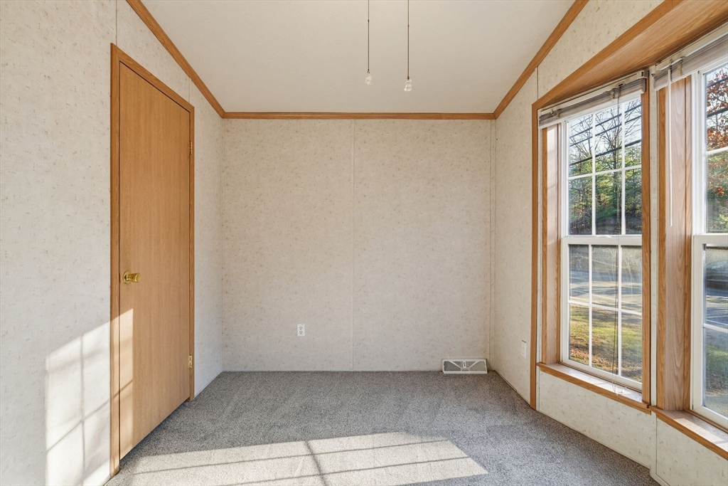 15 Quaboag Valley, Unit 15 Sudbury, MA 01776 - Photo 27 of 35 a view of an empty room with a window