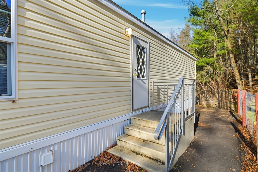 15 Quaboag Valley, Unit 15 Sudbury, MA 01776 - Photo 31 of 35 a view of a balcony with stairs