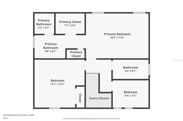 a kitchen with a sink a stove and cabinets