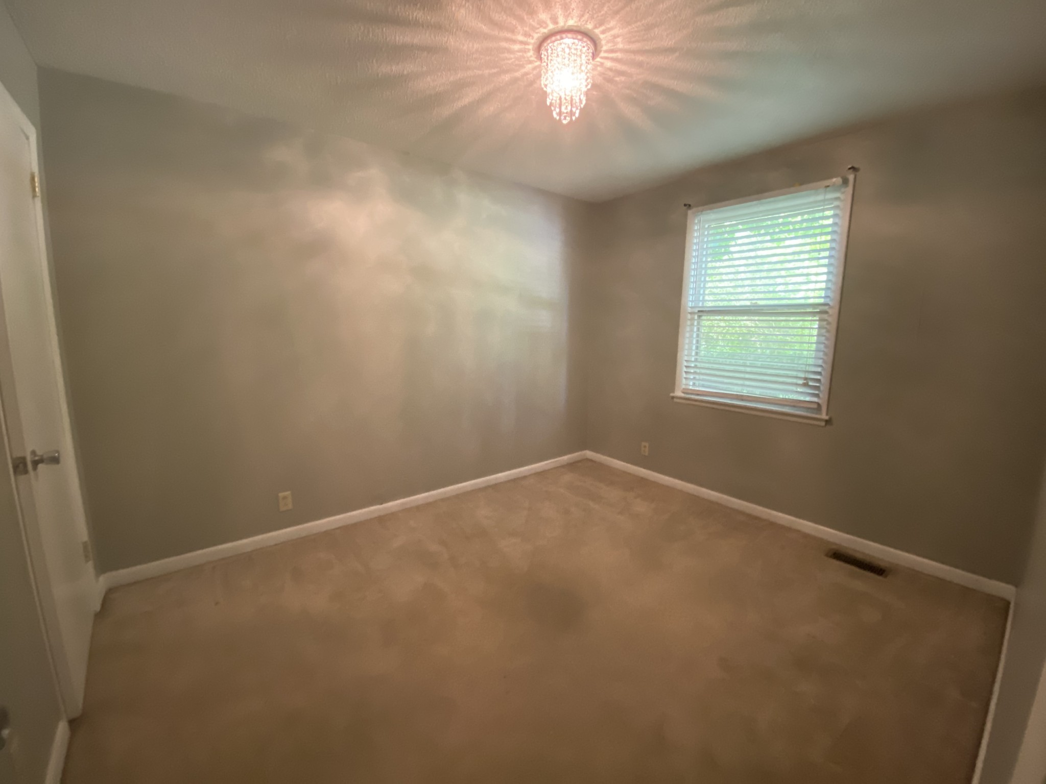 1320 Gratton Road Clarksville, TN 37043 - Photo 11 of 14 an empty room with a window