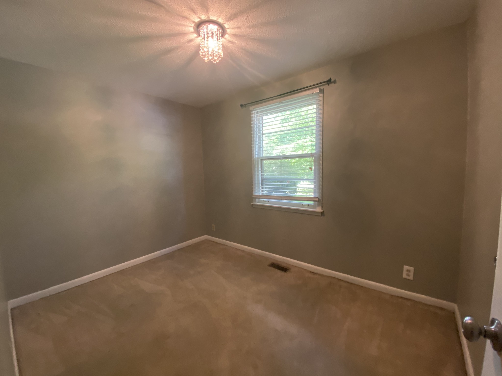 1320 Gratton Road Clarksville, TN 37043 - Photo 10 of 14 an empty room with a window
