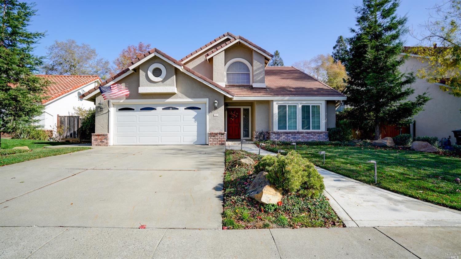 213 Wrentham Drive Vacaville, CA 95688 - Photo 1 of 1 a front view of a house with garden