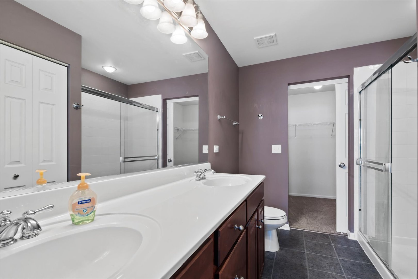 1908 Oxley Circle Naperville, IL 60563 - Photo 14 of 27 a spacious bathroom with a bathtub shower sink and a mirror