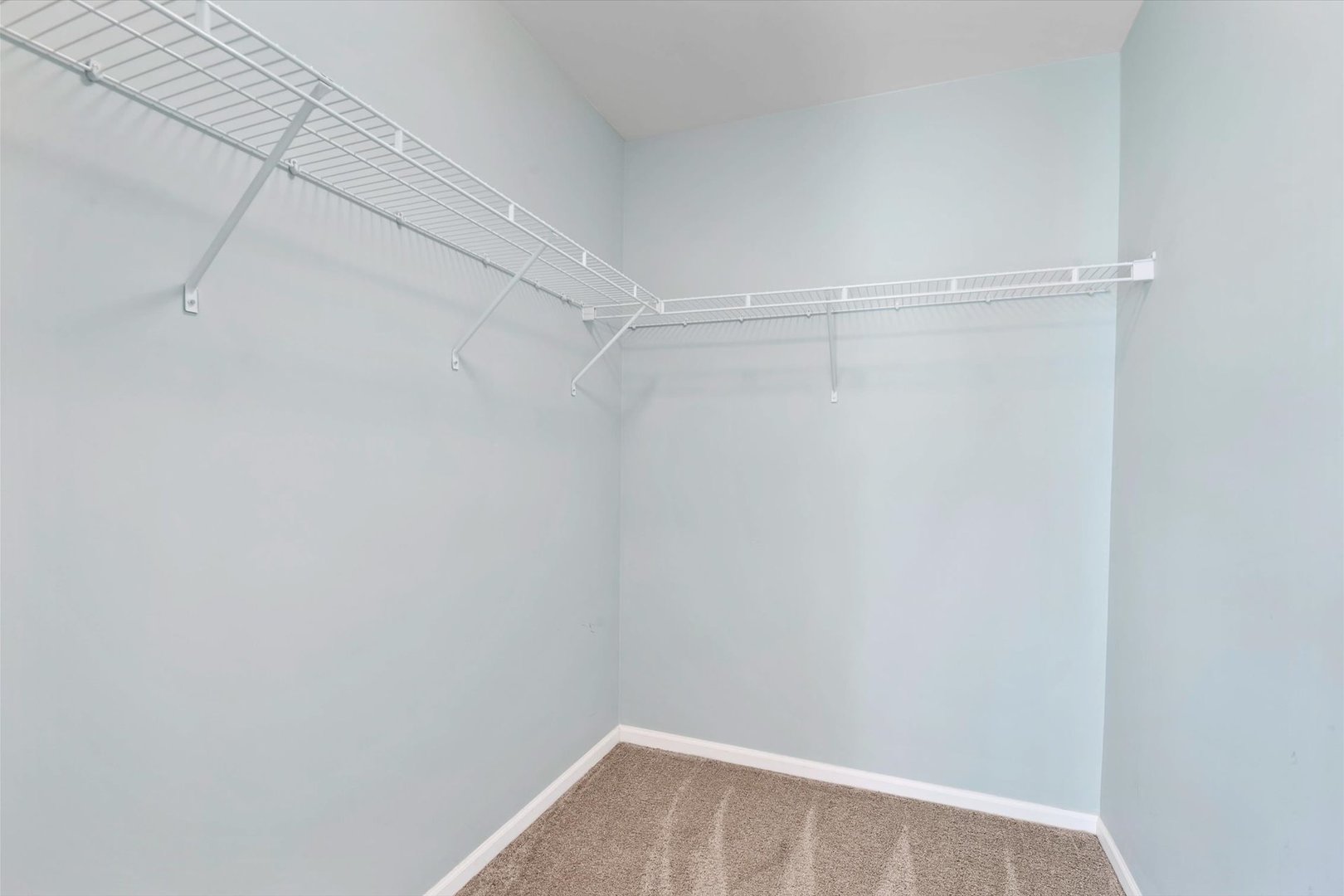 1908 Oxley Circle Naperville, IL 60563 - Photo 18 of 27 a view of a room with racks on the wall