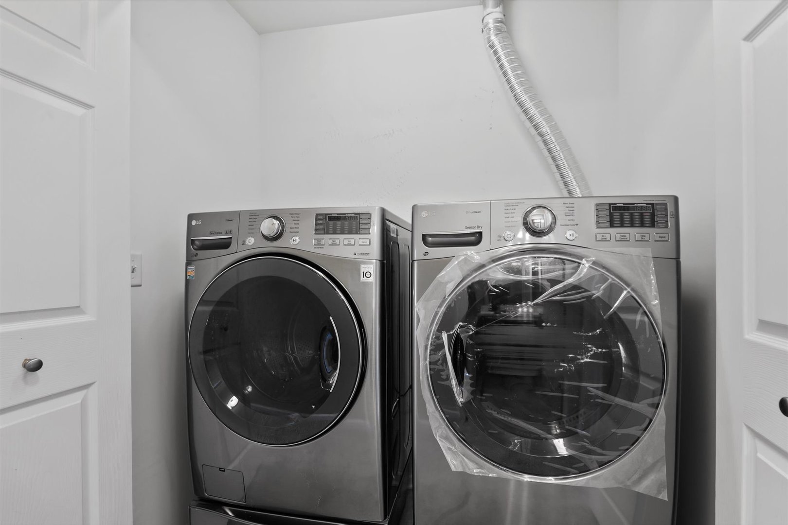 1908 Oxley Circle Naperville, IL 60563 - Photo 19 of 27 a utility room with dryer and washer