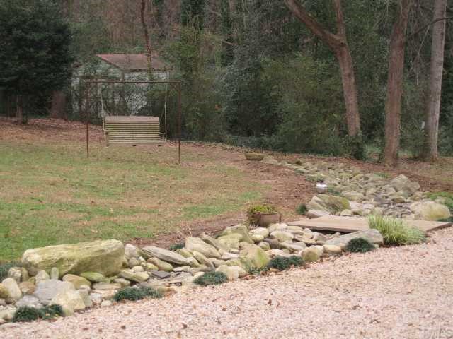 209 Lord Berkley Road Raleigh, NC 27610 - Photo 3 of 12 a view of a yard