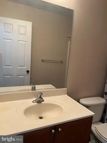 a bathroom with a sink and a toilet
