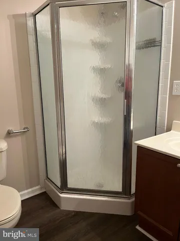 a view of a bathroom with a glass door