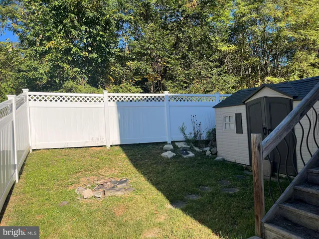 a house with yard in front of it