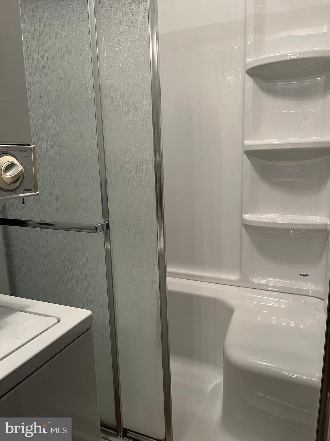 199 Rumbling Rock Road Hedgesville, WV 25427 - Photo 42 of 44 a bathroom with a bathtub