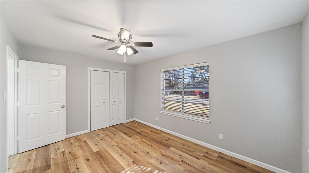 104 Joe Prince Drive Athens, TX 75751 - Photo 18 of 22 a view of empty room with wooden floor and fan