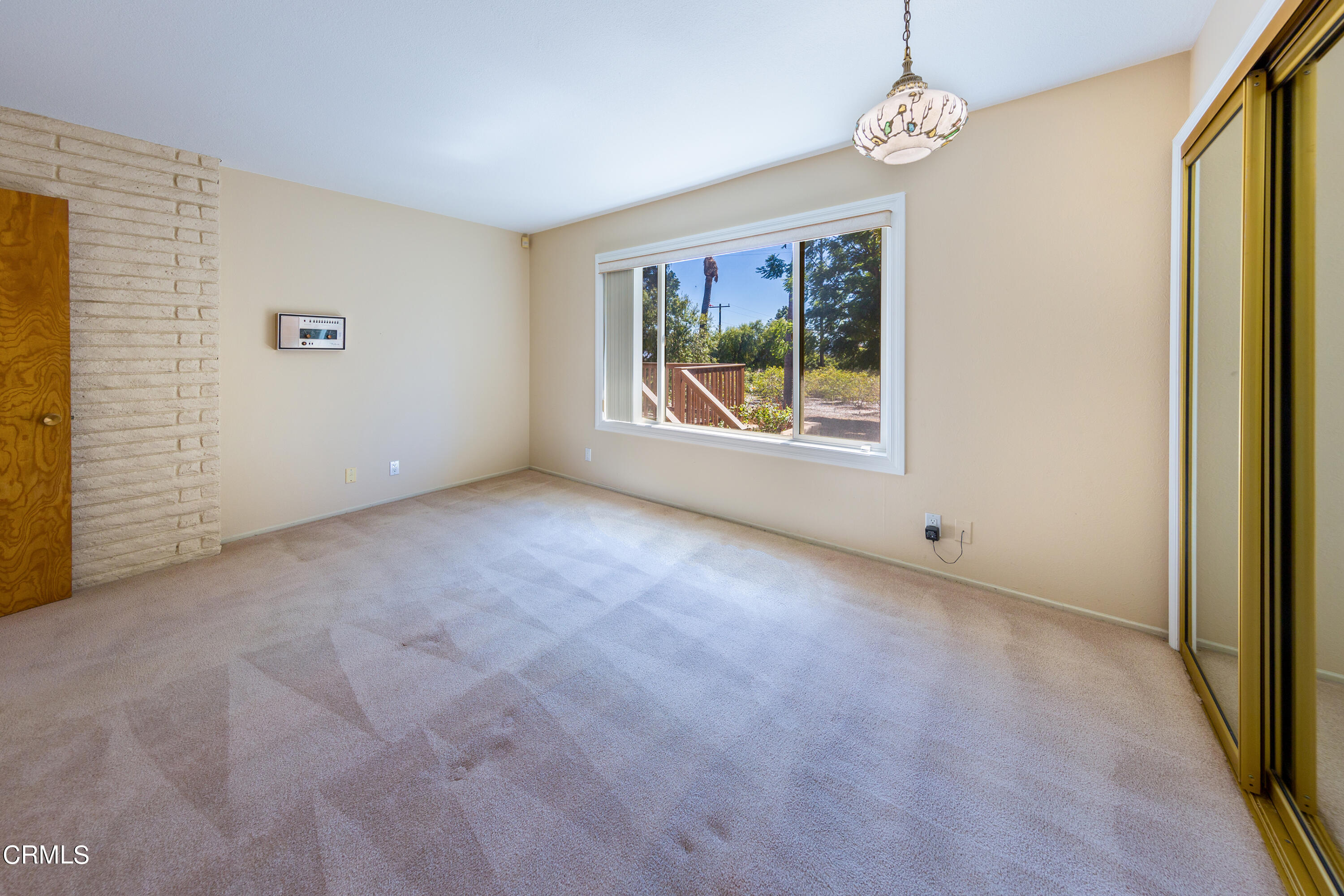 75 Vientos Road Camarillo, CA 93010 - Photo 16 of 36 an empty room with windows and fan