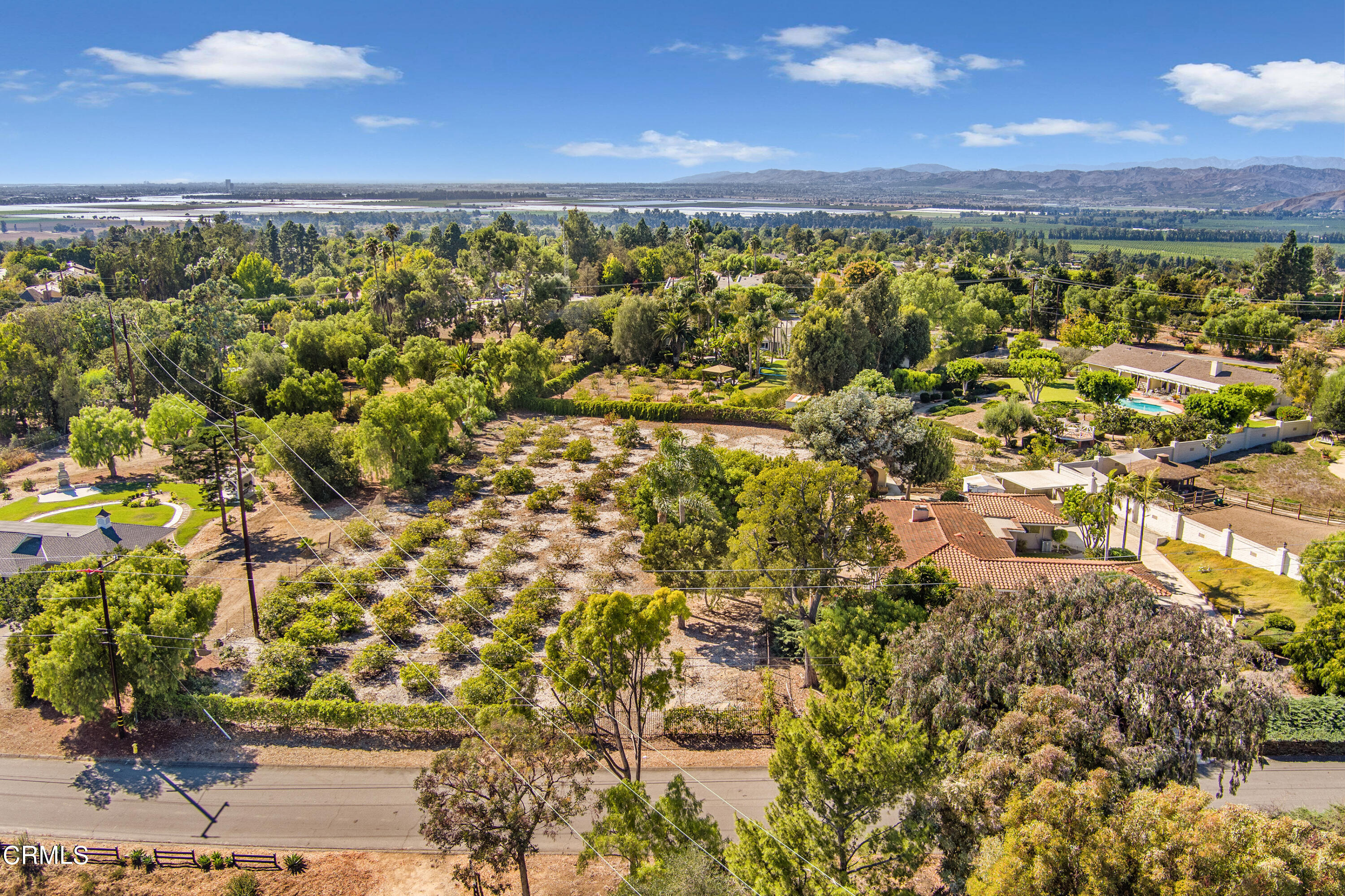 75 Vientos Road Camarillo, CA 93010 - Photo 2 of 36 a view of an outdoor space and a lake view
