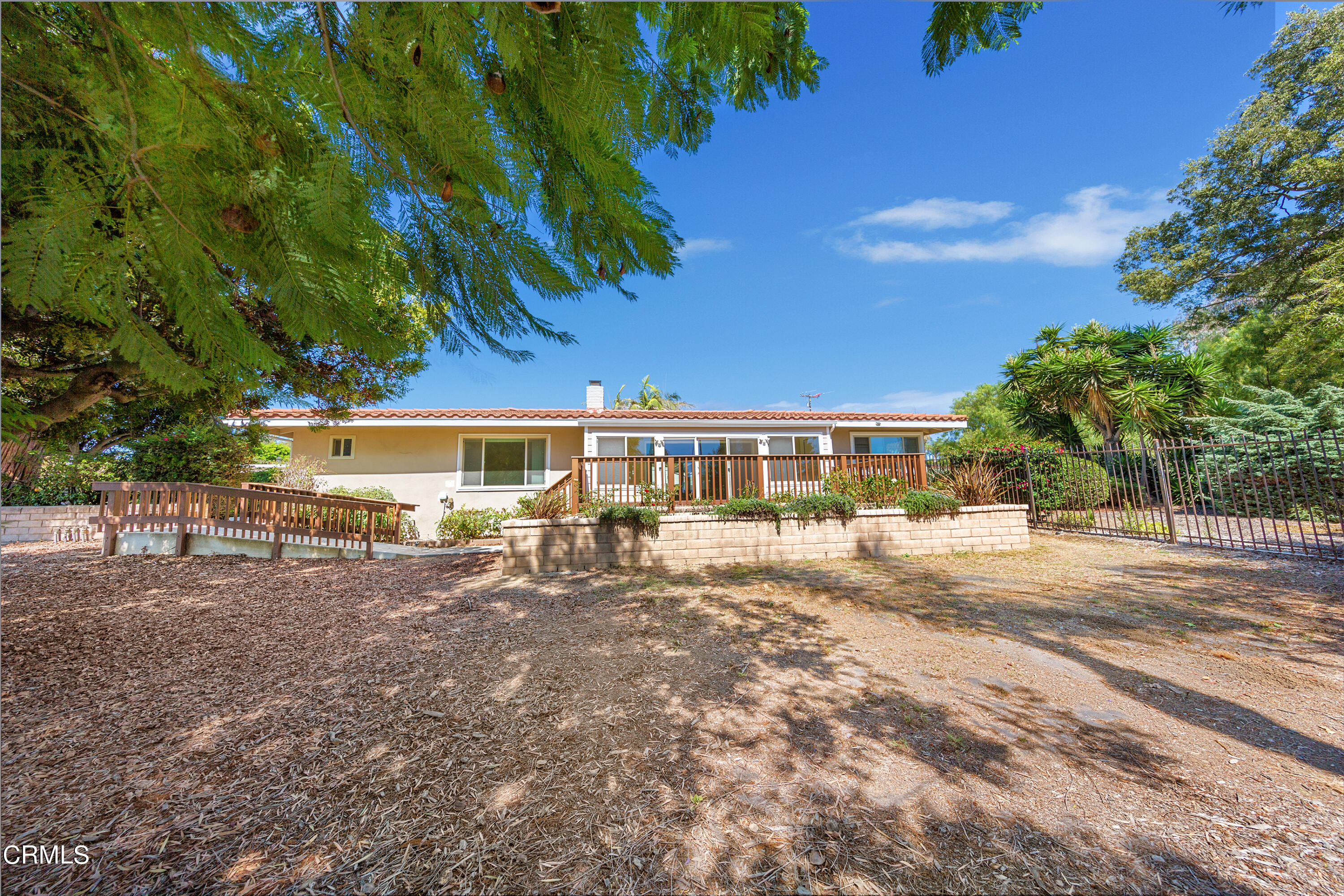 75 Vientos Road Camarillo, CA 93010 - Photo 27 of 36 a front view of a house with yard porch and outdoor seating