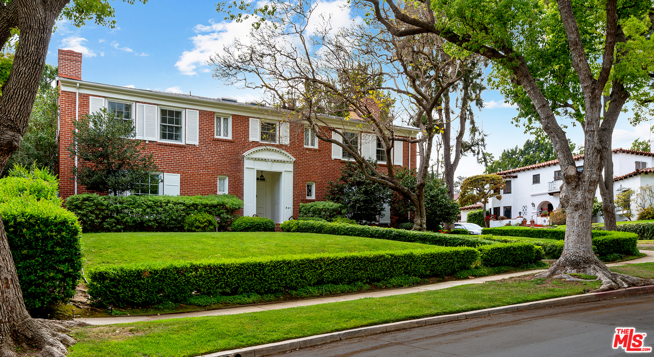 801 Devon Avenue Los Angeles, CA 90024 - Photo 3 of 25 a front view of a house with a yard