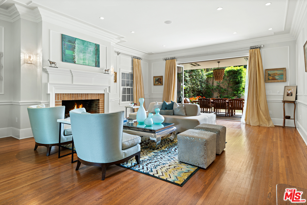 801 Devon Avenue Los Angeles, CA 90024 - Photo 6 of 25 a living room with furniture and a fireplace