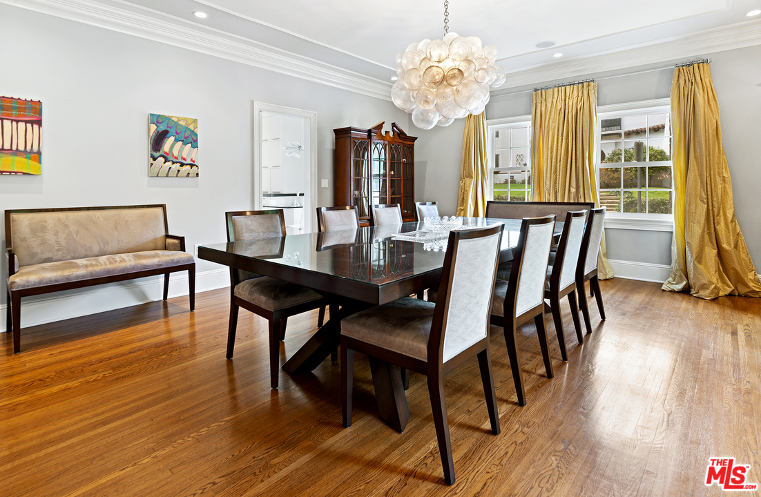 801 Devon Avenue Los Angeles, CA 90024 - Photo 9 of 25 a view of a dining room with furniture window and wooden floor