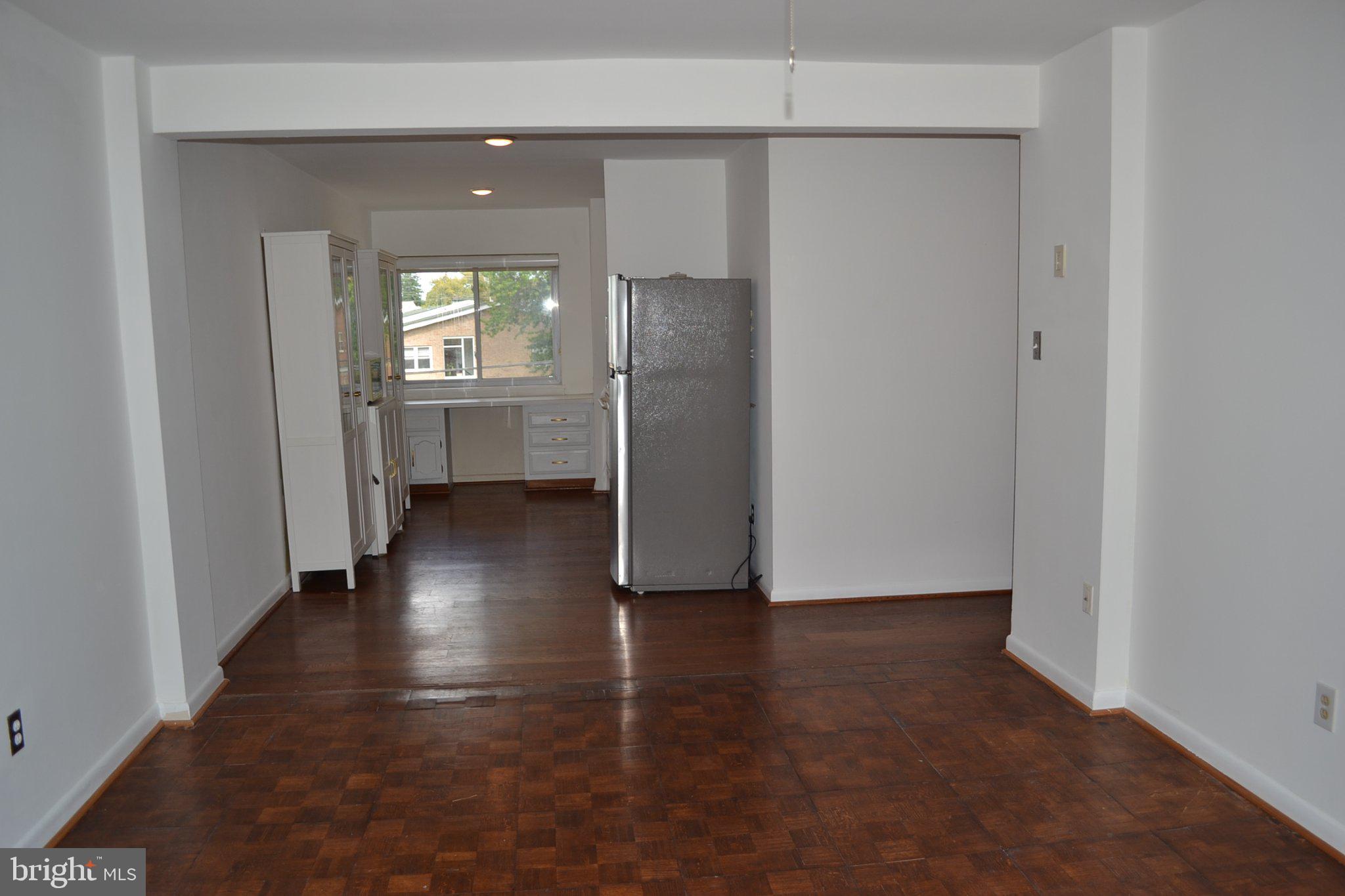 Spacious, light-filled living area.