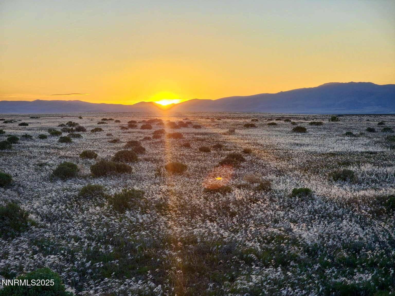 a view of an outdoor space with mountain view