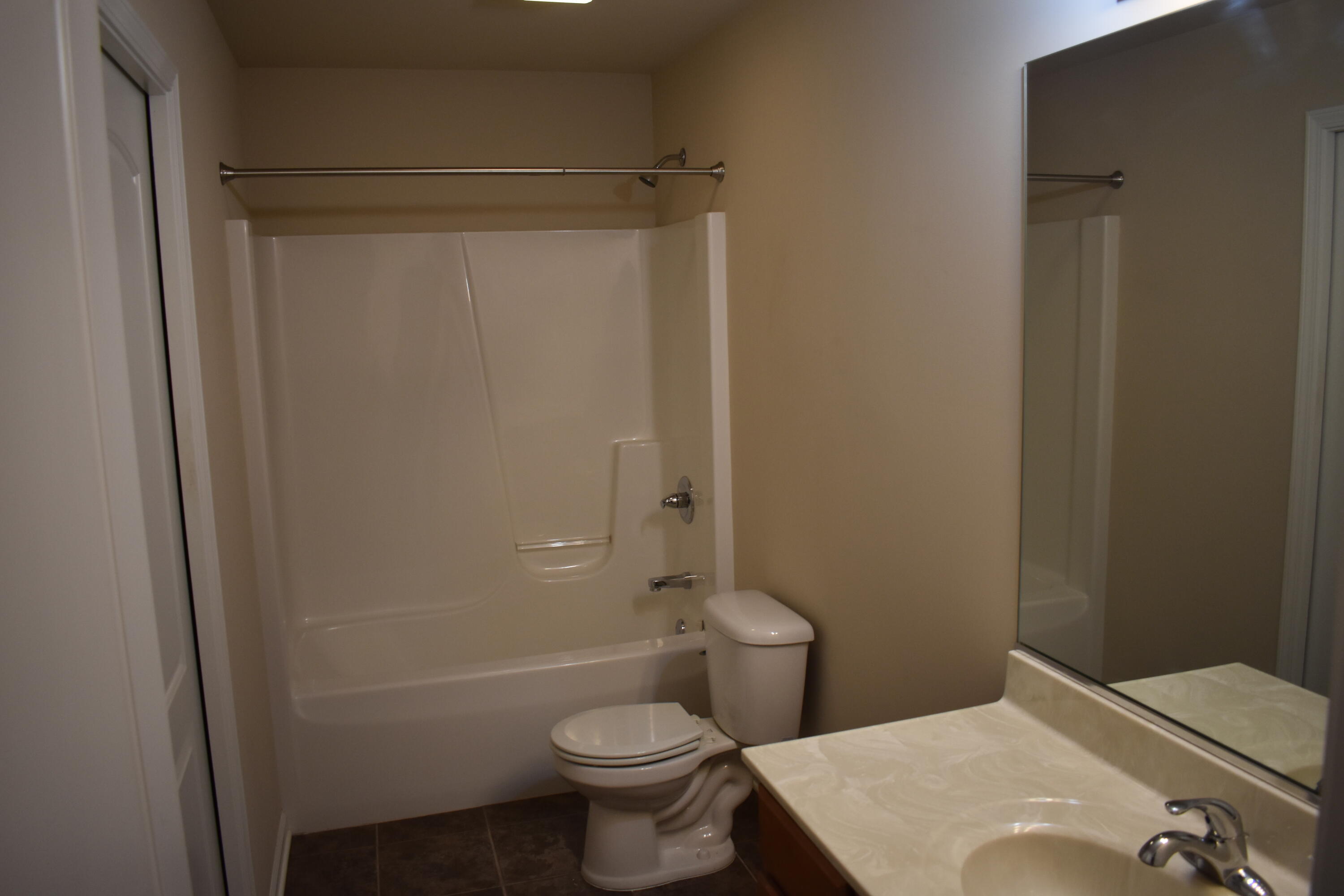 792 Cirque Drive Crown Point, IN 46307 - Photo 9 of 13 a bathroom with a sink a toilet and shower