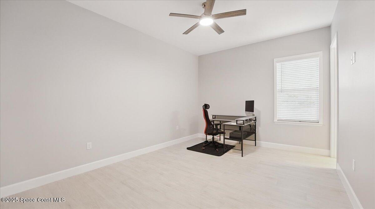 8348 Gullen Drive Melbourne, FL 32940 - Photo 33 of 58 a view of a workspace with a window