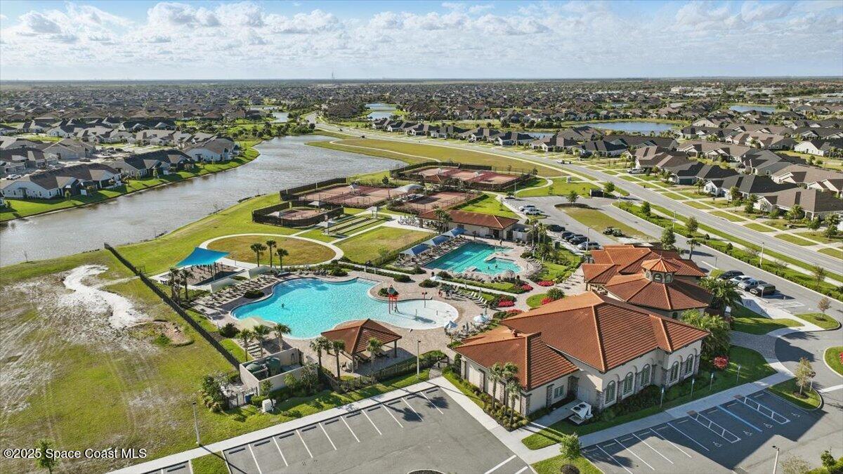 8348 Gullen Drive Melbourne, FL 32940 - Photo 53 of 58 an aerial view of residential houses with outdoor space