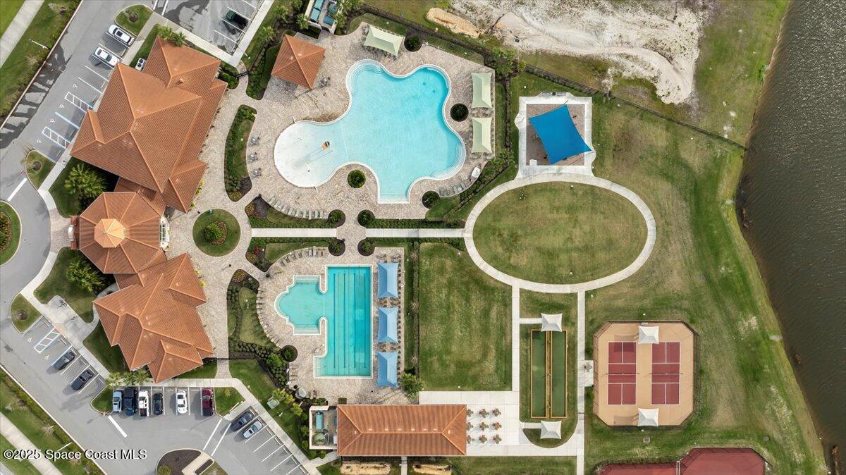 8348 Gullen Drive Melbourne, FL 32940 - Photo 55 of 58 an aerial view of a house with a swimming pool