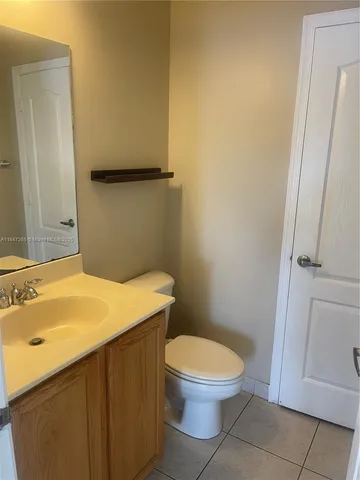 a bathroom with a sink a toilet