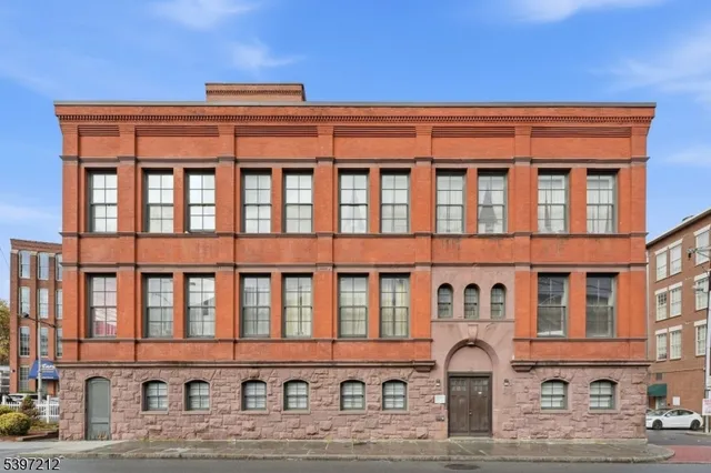 a front view of a building with street